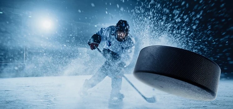 Pro hockey player on ice.